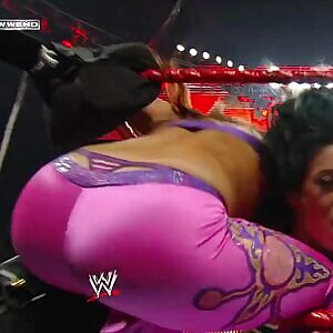 Mickie James and her big ass and thong slips.