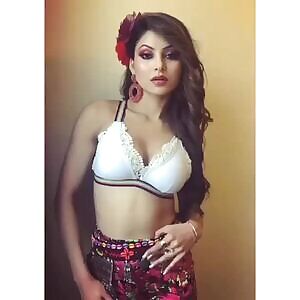 Urvashi 'Randi' Rautela. Doing what she does best, and acting like a true whore that she is.