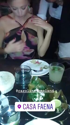 Caroline Vreeland playing with her massive tits during a fancy dinner party