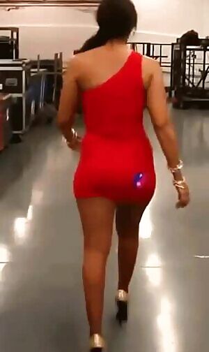 Layla in a tight red dress