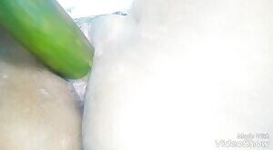 ucking my wet pussy with a huge cucumber