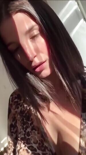 She reveals one sexy boob at a time