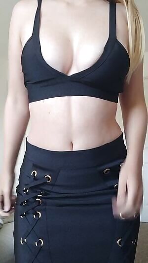 Shaking her tits out