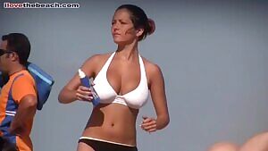 Girl In A Bikini Drops Sunscreen, But Recovers