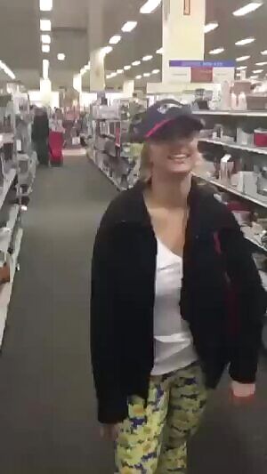 Showing Off Her Nice Tits Inside A Store
