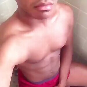 Sticking out his tongue