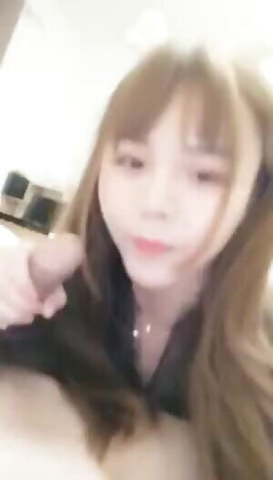 KOREAN GIRL LIKES DICK AND SHE SUCKS IT