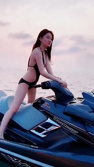 Hot Babe Riding Boat Biker