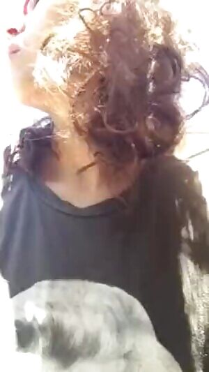 On a sunny day in the yard naked wet beauty