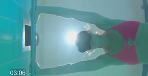Women Under Water Breath Play Pool