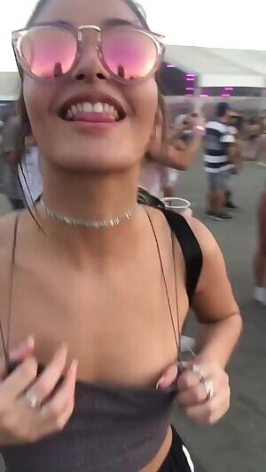 Showing off her tiny tits