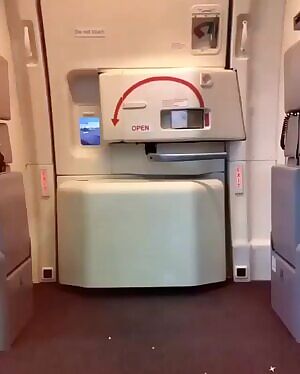 Flight attendant has the magic in her hand