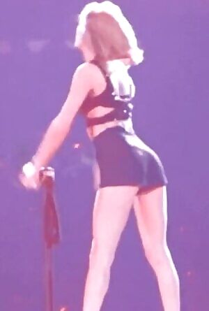 Taylor Swift reaching back and spreading her cheeks for you