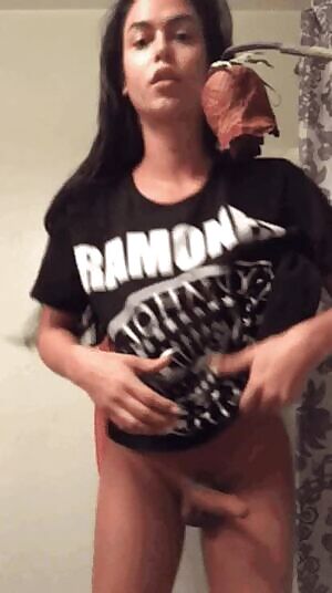 Domino Presley taking off her shirt and showing her cock and boobs