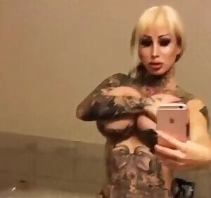 Bouncing inked tits