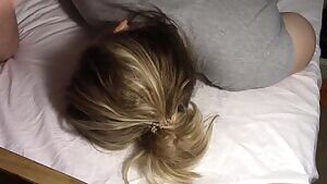 Guy cums on woman's hair.