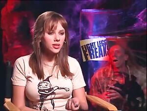 Scarlett Johansson can't even avoid her own huge milkers. Those darn things are just always getting in the way!