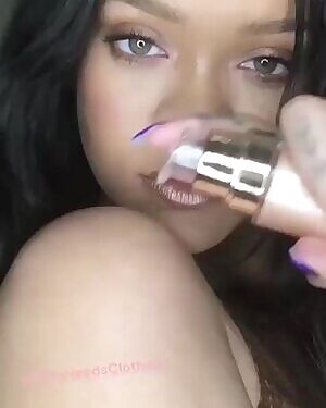 Rihanna looking like she wants you to fuck her brains out