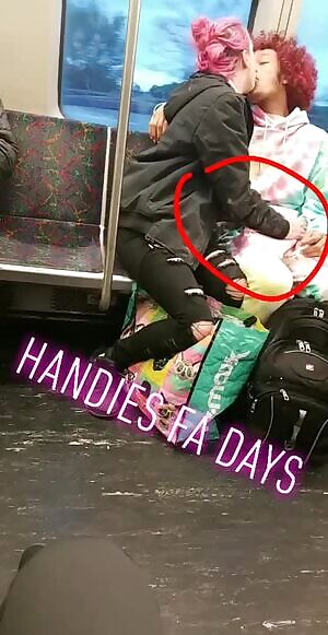 Couple in love in the tram. Woman fingering a guy through pants