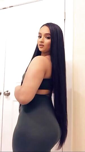 Long hair and a big ol' booty...