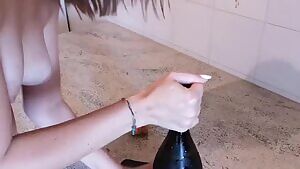 Draining champagne bottle with a blowjob