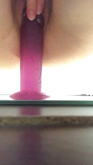 Petite girlfriend fucking one of her suction dildos tease