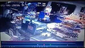 Man robs a gas station, takes a human shield, hostage pulls a gun and covers his asp.