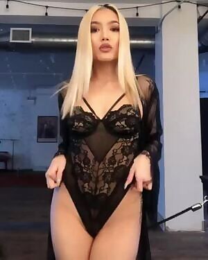 Sexy Asian with a seductive black lingerie