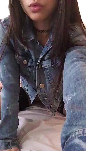 Sexy in her denim jacket